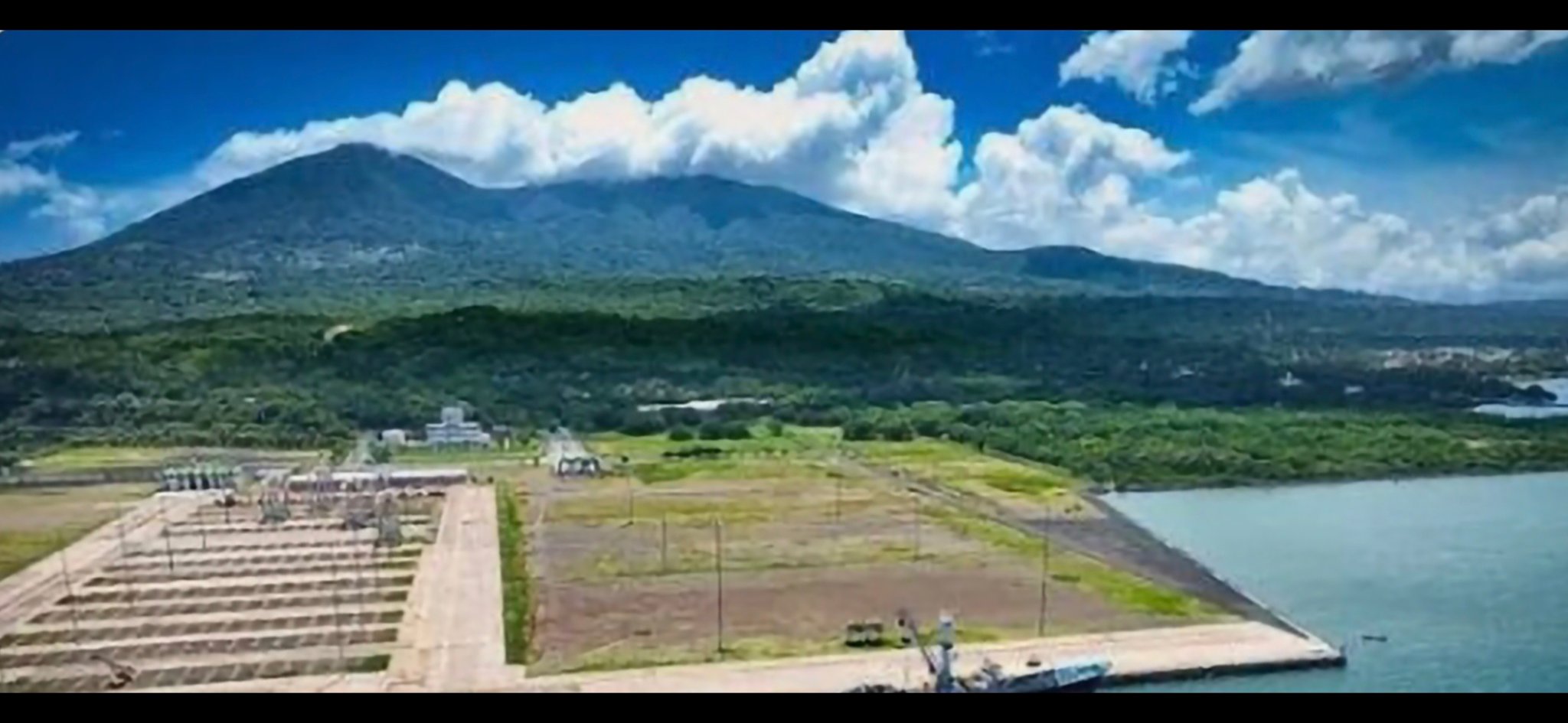 Puerto de La Unión terminal — volcanic backdrop, Gulf of Fonseca